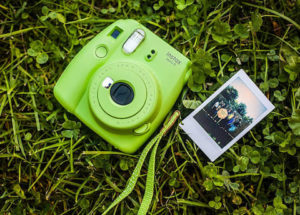 What film does the Lomo'Instant camera take